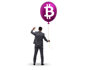 Businessman in bitcoin bubble concept