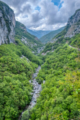 Fototapeta premium Summer panorama of Argentina Valley (Imperia, Northern Italy). Located close to the Ligurian Sea, it cut the Ligurian Alps close to the borders between Italy and France.