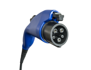 Close up of electric vehicle plug charging car isolated.