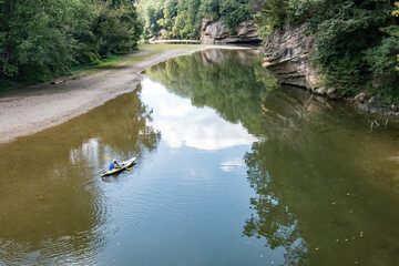 A kayaker rows down Sugar Creek in Parke County, Indiana.