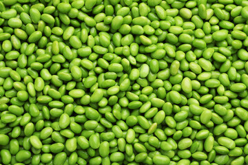 Many edamames as background, top view. Soy beans