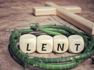 Lent Season,Holy Week and Good Friday concepts - word lent on wooden cubes in vintage background....