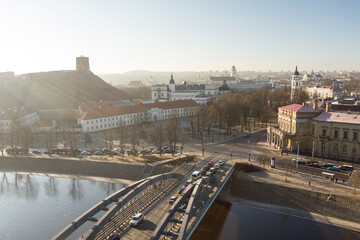 Fototapeta premium Beautiful Vilnius city panorama in winter. Aerial sunrise view. Winter city scenery in Lithuania.