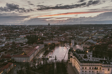 Fototapeta na wymiar Beautiful Vilnius city panorama in winter. Aerial sunset view. Winter city scenery in Lithuania.