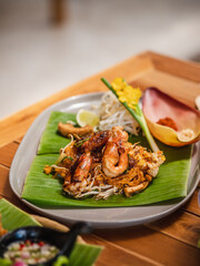 Pad Thai with Shrimp, a stir-fried rice noodle with tamarind sauce, selective focus.