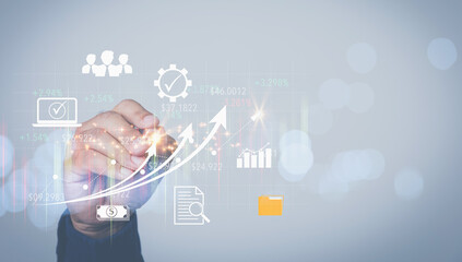 A man touching on growth a graph virtual screen on hand to analyze for an investment of corporate. Business, and Finance concept. Analysis, strategy, and planning for business profit goals.