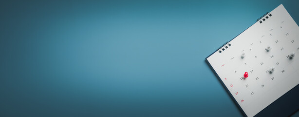 Embroidered red pins on a calendar event Planner calendar,clock to set timetable organize...