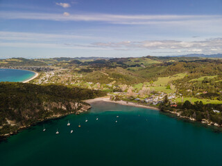 Fototapeta na wymiar Vibrant ocean colours of Ferry landing in the Coromandel Peninsula, New Zealand