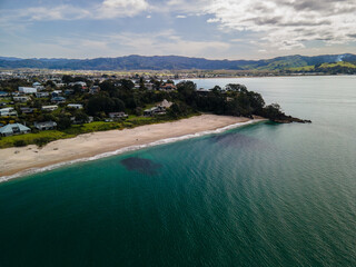 Vibrant ocean colours of Ferry landing in the Coromandel Peninsula, New Zealand