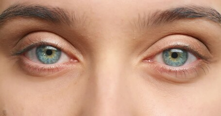 Blue eye, eyesight and vision of woman blink for optometry, wellness and healthcare. Looking, awareness or staring with macro, zoom or closeup of medical examination of human iris anatomy