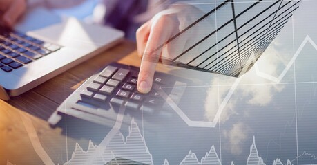 Caucasian male hands calculating over statistics and a blue sky