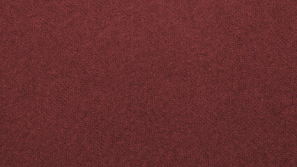 Dark red colored paper texture. Brown tinted background or wallpaper. Textured surface, fibers and irregularities are visible. Top-down