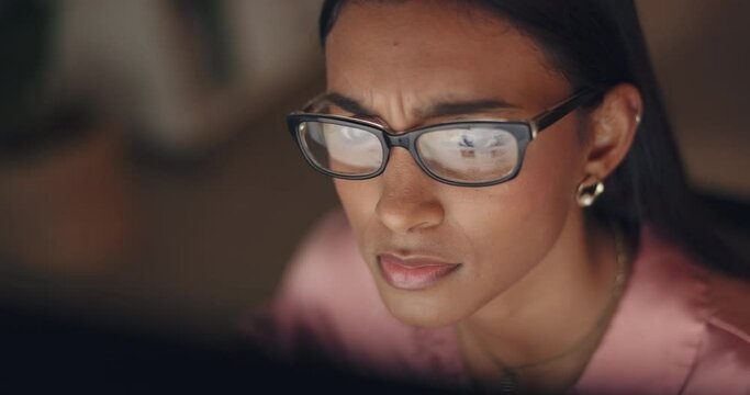 Night, laptop and confused woman with glasses reading business email, finance report or company data analysis. Digital marketing manager with copywriting problem doing research on website information
