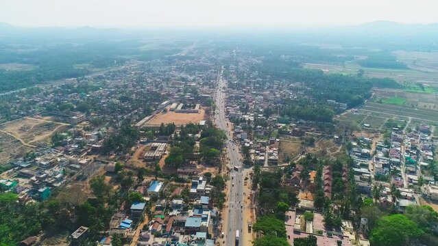 A bird's eye view of ring road between small town