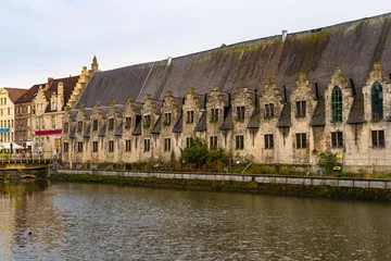 Deurstickers Groot Vleeshuis , former covered market and guildhall in Ghent old town during winter cloudy : Ghent , Belgium : November 30 , 2019 © fukez84