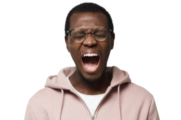 Closeup portrait of screaming with closed eyes crazy black man in grey t-shirt isolated on gray background