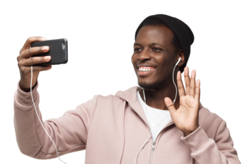 Say hi! Portrait of young handsome african man using smartphone to take selfie pictures and smiling