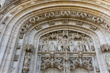 Masterfully decorated facade of Royal Monastery of Brou. Religious complex in Flamboyant Gothic style at Bourg-en-Bresse, France.
