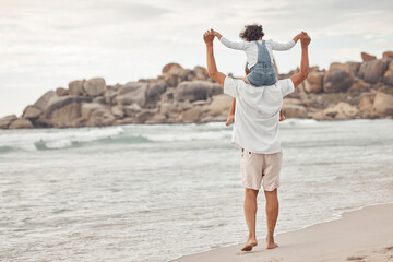 Family, beach and child on shoulder of dad for support on summer holiday, happiness and lifestyle. Freedom, vacation and care with father holding daughter and walking by the sea for love and joy