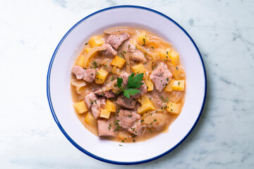 Pork stew with potatoes. Traditional tapas recipe from the north of Spain.