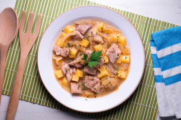 Pork stew with potatoes. Traditional tapas recipe from the north of Spain.