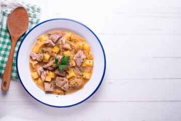 Pork stew with potatoes. Traditional tapas recipe from the north of Spain.