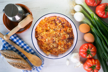 Potato and sweet potato omelette. Modern Spanish recipe of the traditional tortilla tapa.