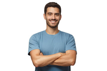 Indoor portrait of young european man standing in blue t-shirt with crossed arms, smiling and...