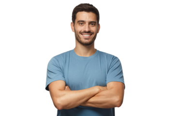 Indoor portrait of young european man standing in blue t-shirt with crossed arms, smiling and looking at camera