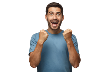 Young man isolated on gray background, celebrating victory and acting as if he is winner, squeezing fists