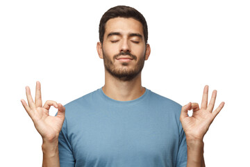 Yoga and meditation concept. Concentrated relaxed man standing with closed eyes, having relaxation...