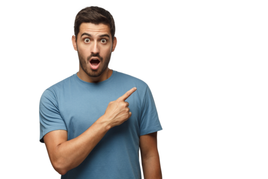 Young surprised man in blue t-shirt pointing right with his finger, shouting WOW. Shock content