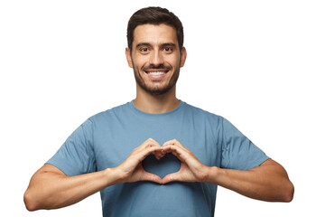 Portrait of young smiling man in blue t-shirt showing heart sign isolated
