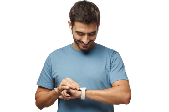 Young handsome man wearing wireless headphones and blue t shirt, checking smart watches with touch screen