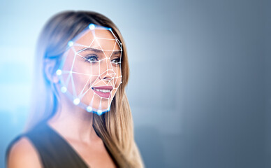 Young businesswoman and biometric scanning digital hologram. Copy space