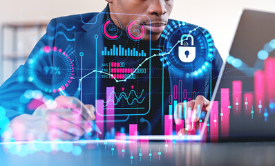African businessman with laptop, forex graph chart and financial data, security