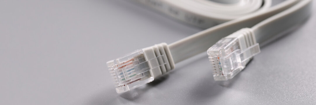 Closeup of rj45 cable on gray background