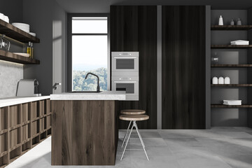 Grey kitchen interior with bar countertop and seats, panoramic window