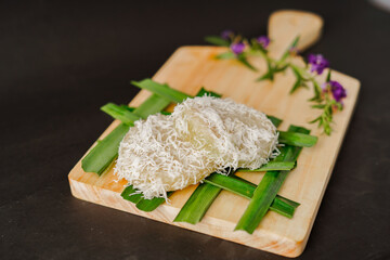 Songkolo is a typical food from Makassar. This food is sticky rice which is steamed then added with grated coconut to make it taste more savory.