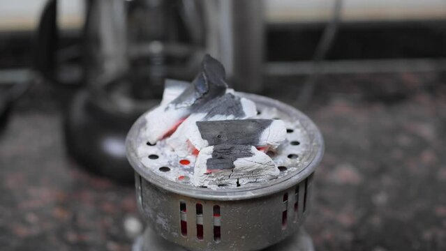 Time lapse Charcoal burn with machine 