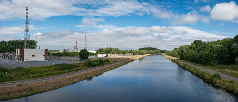 Seneffe, Wallon Region, Belgium, Old industrial plants and chimney at the banks of the sea canal