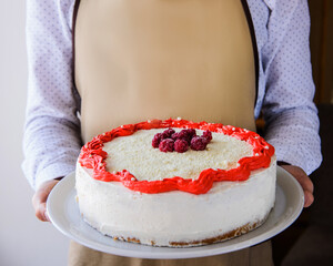 person holding a cake