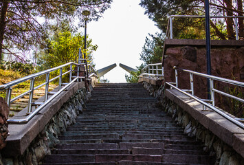 Obraz premium Abstract stairs in the Medeo, Almaty. Abstract steps, cement stairs, wIde stone stairway,wide stone stairs, steps, diagonal, nobody