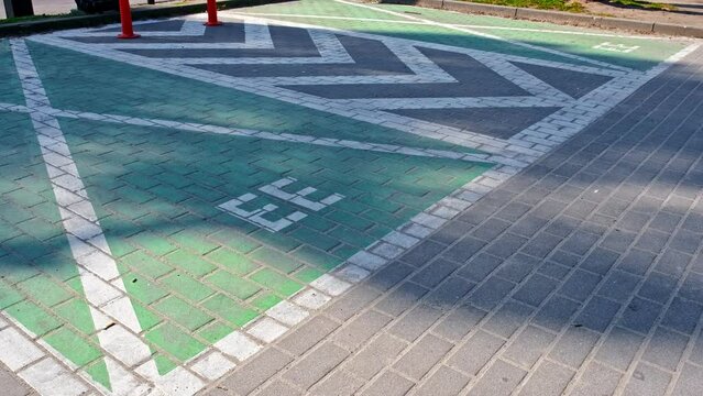 Reserved Empty Parking Spot with Charger for Electrical Vehicles