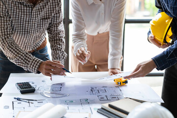 Architects, engineers, designers, working on concepts, planning, blueprints, brainstorming, coming up with new ideas and ideas. work planning Construction concept and design