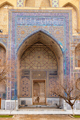 The pattern on the wall of the madrasah. Registan square. Samarkand city, Uzbekistan.