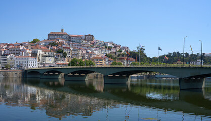 Fototapeta na wymiar Panorama of Santa Clara bridge over Mondego river in Coimbra, Portugal