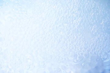 Blue water texture. Bubbles and bubbling water.