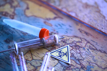 Ukrainian flag biohazard and test tubes. Assistance to Ukraine in biolaboratories. Western...