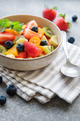 Healthy fresh fruit salad in a bowl